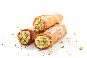 Sweet homemade cannoli stuffed with ricotta cheese and pistachio. Sicilian dessert. Italian pastry. isolated on a white background - obrazy, fototapety, plakaty