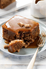 Easy Sticky Toffee Pudding is a deliciously gooey sponge cake drenched in warm toffee sauce that’s a favorite among the English. 