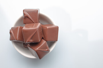 Assortment of chocolate candies sweets isolated on a white background