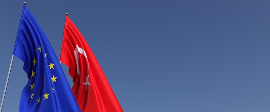 Flags of the European Union and Turkey on flagpoles on side on a blue background. Place for text. EU. Istanbul. 3d illustration.