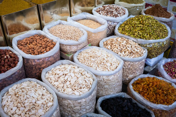 bags of nuts, seeds and ingredients for sale on food market (Suq, Damascus)
