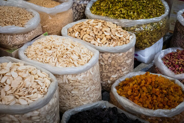 bags of nuts, seeds and raisins, food ingredients on market (Suq, Damascus)