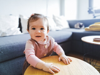 child sitting on the floor