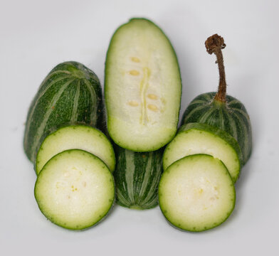 pointed gourd potol green vegetable on white background