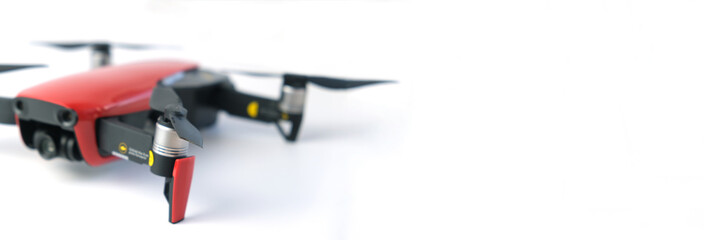 4,05,2022, Kurgan city. Drone mavik air with broken screws on a white background. banner with copy space. selective focus