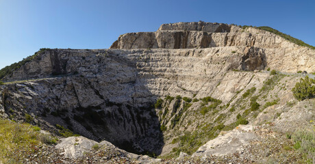 Landscape of abandoned marble quarry near the town of Campiglia Marittima, Tuscany, Italy
