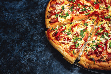 Sliced pizza top view with a place for the inscription. Round pizza