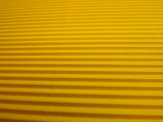 yellow background with longitudinal stripes as an abstraction