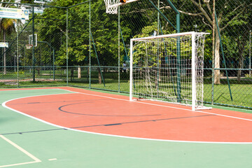 View of a sports court with beams and table with basket inside a park. Widely used for football,...