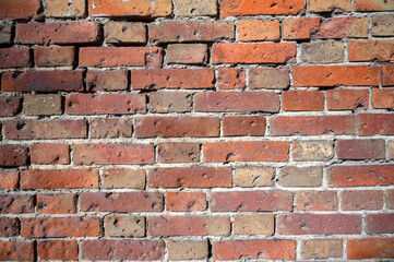 Texture of old vintage orange brick wall