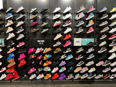 Variety of footwear on sale at a Kids Foot Locker. store.