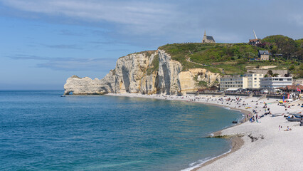 Panoramic view of the white chalk cliffs of Etretat in Normandy (France).