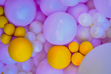 balls of blue or purple color, composition on the wall at a presentation or holiday 