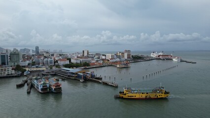 Fototapeta na wymiar Georgetown, Penang Malaysia - May 13, 2022: The Swettenham Cruise Ship Terminal with Some Cruise Ships Docking
