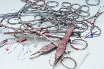 Used surgical instruments, placed on the table after surgery