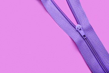Stylish zipper on purple background