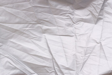 crumpled fabric as a textured grey background