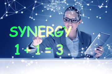 Naklejka premium Businesswoman in synergy business concept