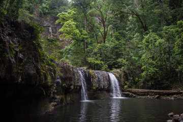 Nandroya Falls in Wooroonoonan National Park, Queensland, Australia. - obrazy, fototapety, plakaty