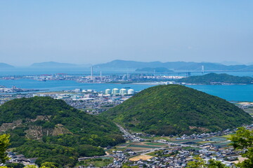 Landscape of sakaide city suburbs with the seto ohashi bridge , kagawa, shikoku, japan	