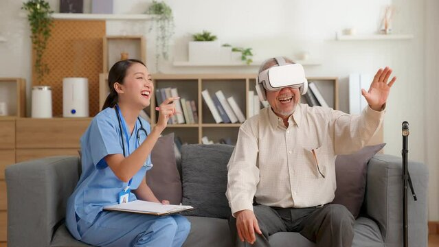 Elderly patients using vr glasses and nurse assisting, explain virtual reality technology at home. female doctor and senior man playing virtual game, having fun and enjoy with glasses VR technology.