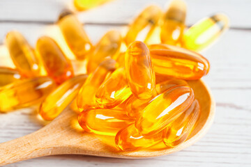 Fish oil or Cod liver oil gel in capsules with omega 3 vitamins, supplementary healthy food