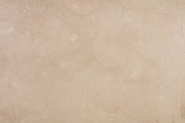Crema Marfil marble background, natural texture for interior work. Slab photo.