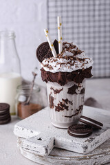 Sweet milkshake with whipped cream