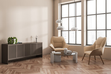 Corner view on bright living room interior with two armchairs