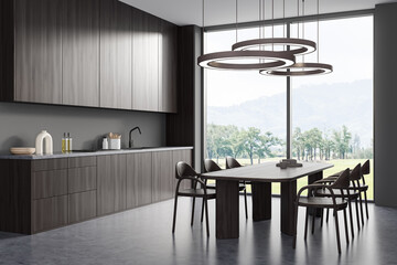 Corner view on dark kitchen room interior with dining table