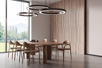 Minimalist living room interior with dining table and chairs, panoramic window