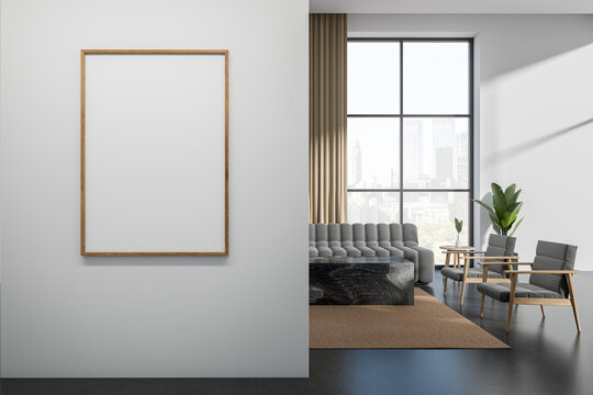 Light living room interior with sofa and armchair near window, mockup poster