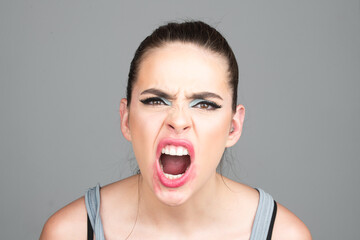 Screaming, hate, rage. Pensive woman feeling furious mad and crazy stress. Sad and angry face....