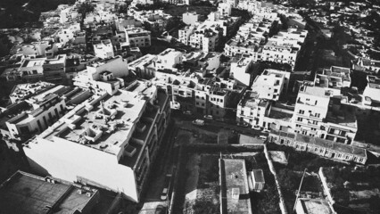 Fototapeta premium Aerial view of Mellieha cityscape from drone, Malta
