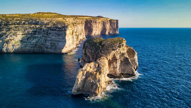Aerial view of Fungus Rock in Dwejra Bay, Gozo