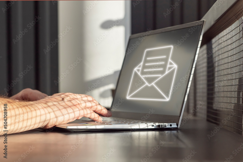 Poster spam email. man receiving junk mail, unwanted messages, ads for money scams while working on laptop.