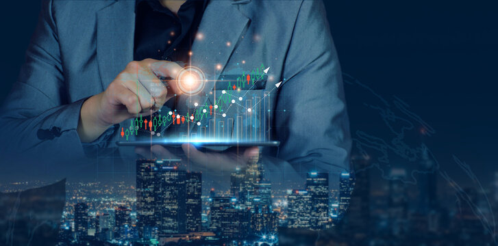 Businessman planning to invest in stock market. man touching success goals icon on virtual screen, stock graph is rising, economy is recovering, stock trading, bussiness start up, business success.