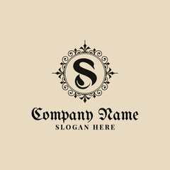 the letter s forms a swan and a leaf in a vintage style