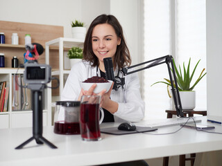 Female nutritionist talking about hibiscus drink infusion tea