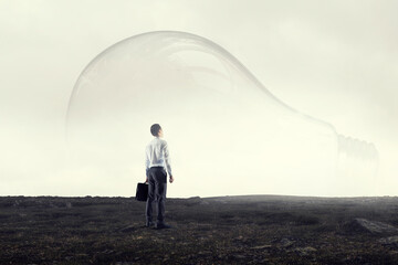 Huge bulb lamps on a grey foggy background