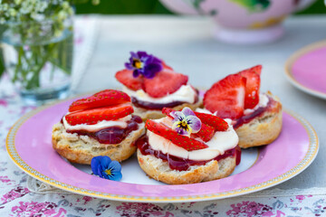 Traditional english afternoon tea with selection of cakes and sandwiches