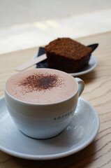 cup of cafe mocha with chocolate brownie