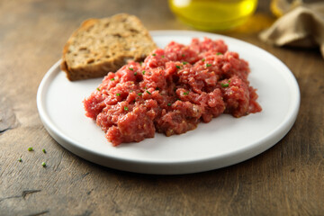Homemade steak tartare with rye bread