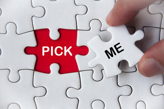 Pick me text on missing jigsaw puzzle. Employment and hiring concept