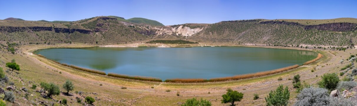 Travel to Turkey - panorama of Narligol Crater Lake (Lake Nar) in Geothermal Field in Aksaray Province of Cappadocia in spring
