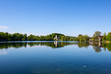 Church at the Wesslinger See, summer time, biotope and nature reserve