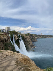 Obraz premium Duden waterfall in Antalya, Turkey in a beautiful summer day. Lower Duden waterfalls on Mediterranean sea coast
