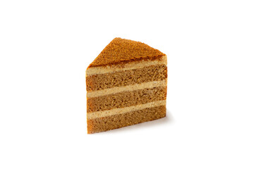 Slice of layered honey cake isolated on white