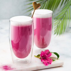 Pink matcha latte with milk. Trendy drink from dragon fruit powder