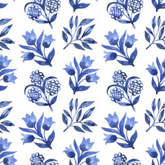Fototapeta premium Watercolor seamless pattern with floral motifs in folk style. Blue watercolor flowers and branches in ornamental style background. Printing on fabric, wallpaper, textiles.